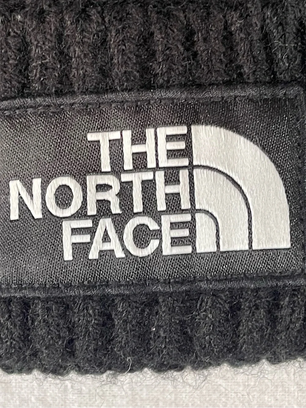 The North Face Black Ribbed Cuffed Beanie with Logo Patch